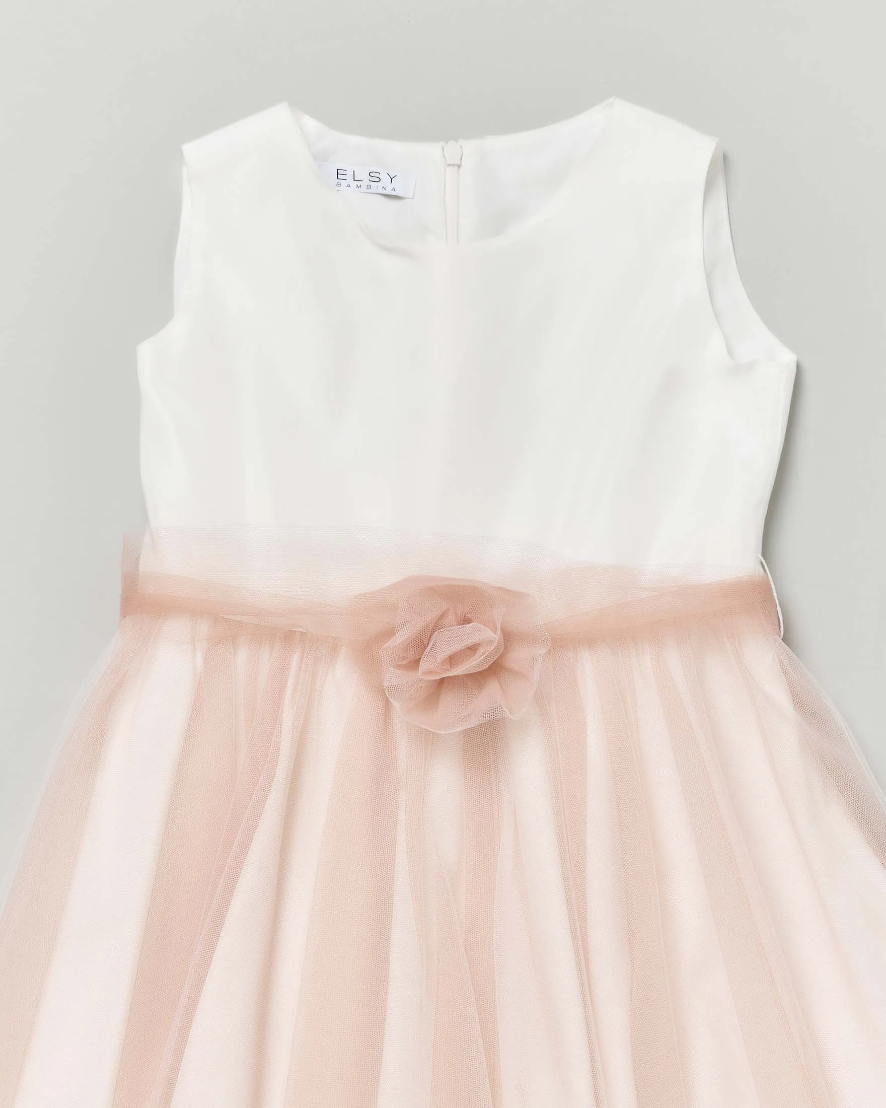 Abito mini bianco senza maniche con tulle cipria e fusciacca in organza cipria con fiore 10-12 anni