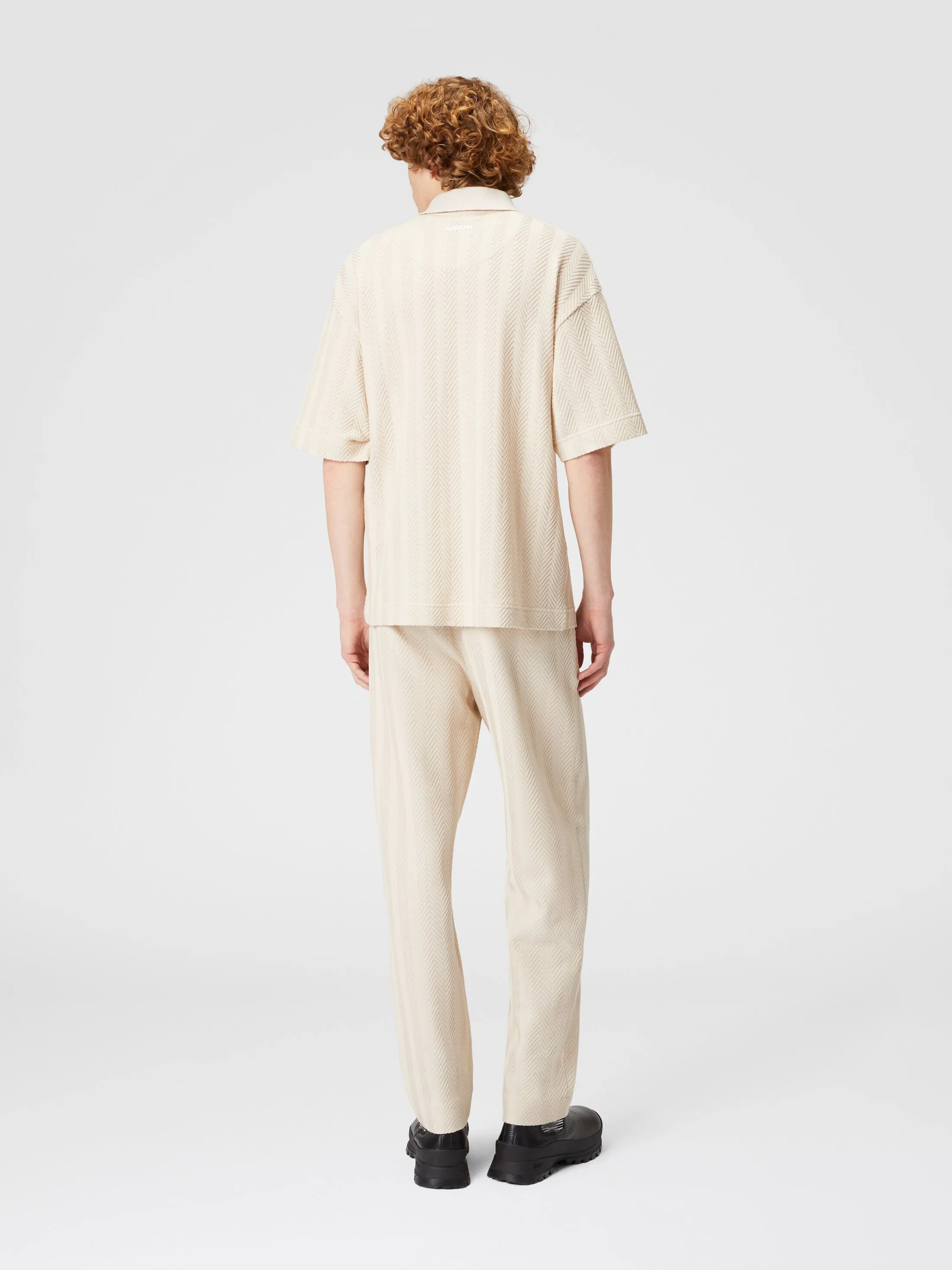 Polo in maglia boxy fit con chevron tono su tono